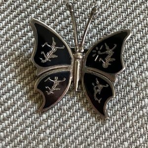 Sterling silver and black enamel Siam Pin.